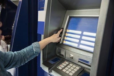 people-waiting-to-get-money-from-automated-teller-machine-people-withdrawn-money-from-atm-concept-min
